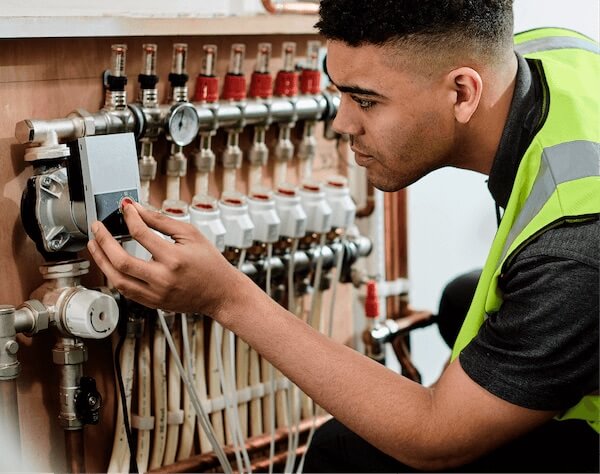 young man doing electrical work